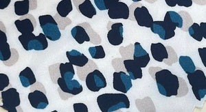 Polyester blue, gray and black dots silk type fabric