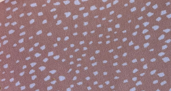 Tela Polyester puntitos rosas